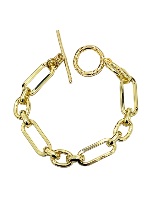 Jasmine Gold Chunky Paperclip Bracelet – a trendy yet timeless 18K gold-plated brass chain bracelet with a 12mm width and a toggle clasp. Available in three lengths: Small (7.5”), Medium (8.0”), and Large (9”). Handmade in Texas and donated by Christy Jean.