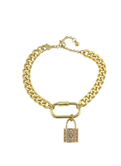 The Ryder Bracelet in Gold – a high-polish curb chain bracelet with heart lock and key charms. Adjustable from 6.5” to 8”, crafted from gold over brass for a stylish and elegant look."