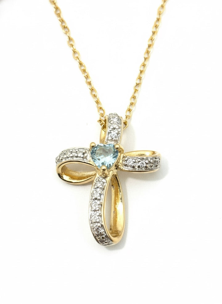 Blue Topaz Heart Cross Necklace in Sterling Silver