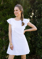 Woman wearing White Eyelet Ruffle Dress
